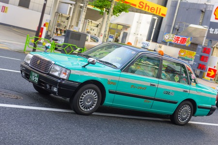 TOKYO, JAPAN - NOVEMBER 02, 2014: Taxi in Japan. Taxi in japan is one of the most expensive in the world.のeditorial素材