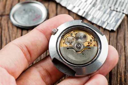closeup the movement of old swiss made automatic watch