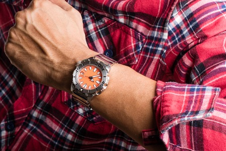 closeup luxury watch on man's wrist