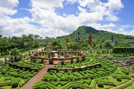 CHONBURI, THAILAND - AUGUST 08, 2015: Beautiful garden decoration in Nong Nooch Tropical Botanical Garden. Nong Nooch Tropical Botanical Garden is a 500-acre botanical garden in Chonburi, Thailand.のeditorial素材