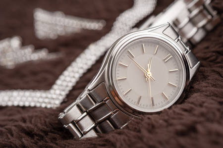 closeup classic woman wristwatch with stainless steel braceletの写真素材