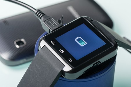 charging battery of black smart watchの写真素材