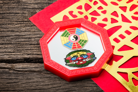 Octagon mirror or Feng Shui Bagua Mirror, Chinese use to repel negative energy.の写真素材