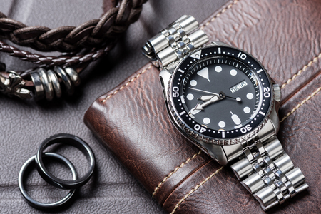 closeup men dive watch with stainless steel braceletの写真素材
