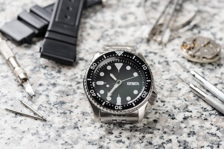 closeup men dive watch with stainless steel braceletの写真素材