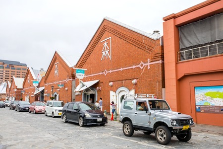 HOKKAIDO, JAPAN - JULY 19, 2015: The Kanemori Red Brick Warehouse in Hakodate port. The Kanemori Red Brick Warehouse is the first commercial warehouse in Hakodate, Hokkaido, Japan.のeditorial素材