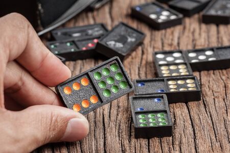 Dominoes. Dominoes is a game played with rectangular "domino" tiles.の写真素材