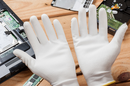 electrician use antistatic gloves in his work.の写真素材
