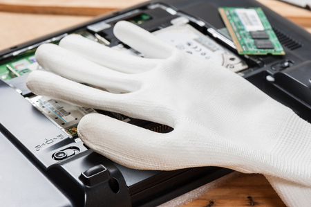 white antistatic gloves, antistatic gloves reduce static electricity which can damage electrical components.の写真素材