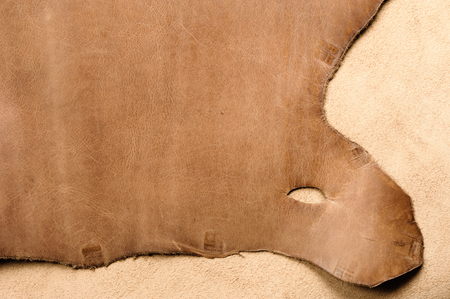 raw material background, closeup details of brown leather textureの写真素材