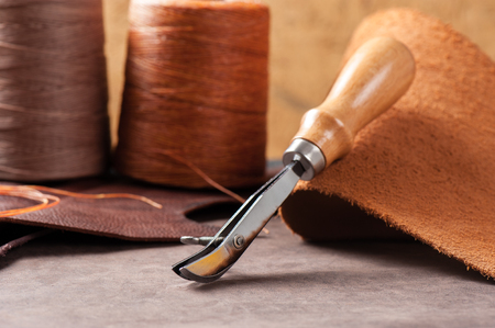 The adjustable double creaser for leather working