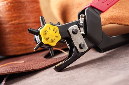 The rotary leather punch for hand stitching leatherの写真素材