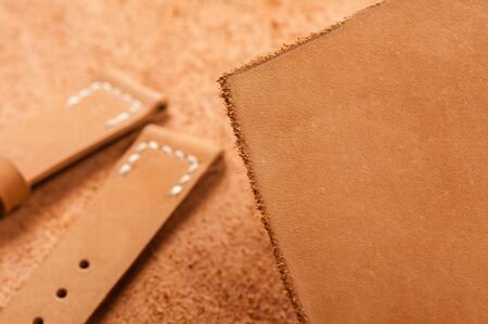 leather working, closeup details of brown nubuck leather