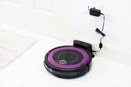 robotic vacuum cleaner on the floorの写真素材
