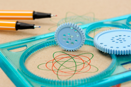 Drawing the spirograph pattern with spirograph kitの写真素材