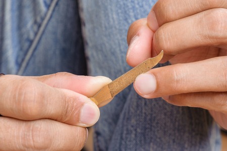 hand manicure with nail clipper and file.の写真素材