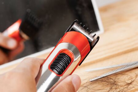 electric hair clipper, electric beard and stubble trimmer