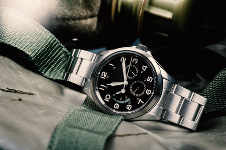 Closeup military or field style wristwatch, luxury automatic wristwatch for menの写真素材