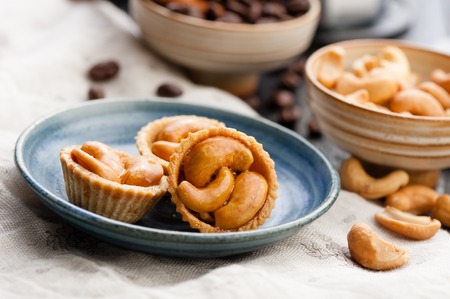 cashew nut pie, mini pie with cashew nuts on topの写真素材