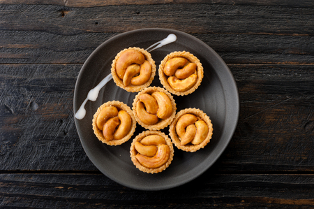 cashew nut pie, mini pie with cashew nuts on topの写真素材