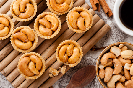 cashew nut pie, mini pie with cashew nuts on topの写真素材