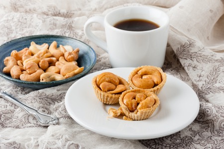 cashew nut pie, mini pie with cashew nuts on topの写真素材