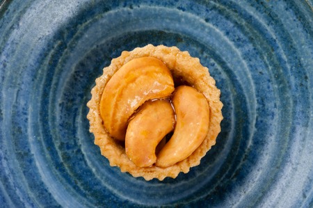cashew nut pie, mini pie with cashew nuts on topの写真素材