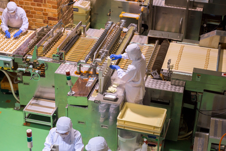 HOKKAIDO, JAPAN - JULY 22, 2015: The production lines of Shiroi Kohibito inside Ishiya Chocolate...