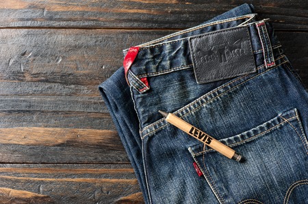 BANGKOK, THAILAND - NOVEMBER 01, 2016: An old wooden souvenir pen from LEVI's. LEVI'S is a brand...