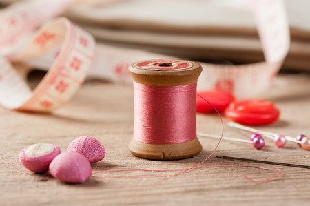 closeup thread for sewing and needlework, old reel of threadの写真素材