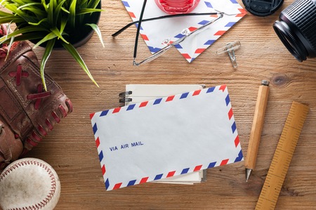air mail envelope on the wood table
