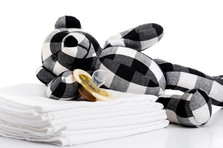 closeup new yellow baby pacifier, silicone nipple. Pacifier also call dummy or binky or soother or teether. Childcare concept.の写真素材