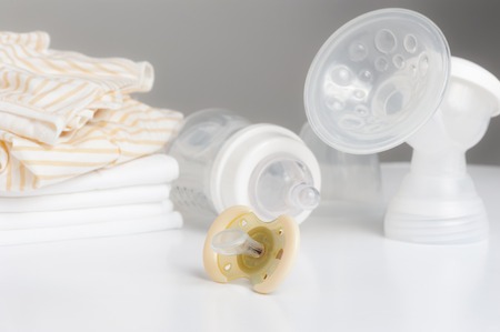 closeup new yellow baby pacifier, silicone nipple. Pacifier also call dummy or binky or soother or...
