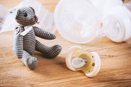 closeup new yellow baby pacifier, silicone nipple. Pacifier also call dummy or binky or soother or teether. Childcare concept.の写真素材