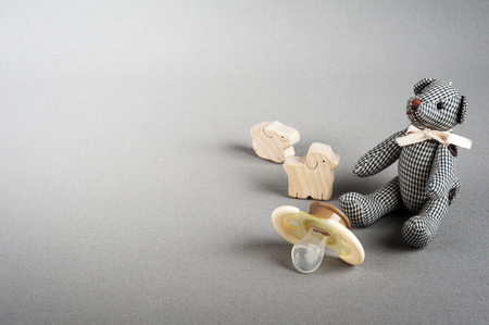 closeup new yellow baby pacifier, silicone nipple. Pacifier also call dummy or binky or soother or teether. Childcare concept.の写真素材