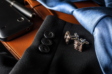 closeup shiny cufflinks with gemstones, accessory for men