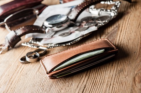men's leather accessory, closeup at handmade vegetable tanned leather minimalist wallet