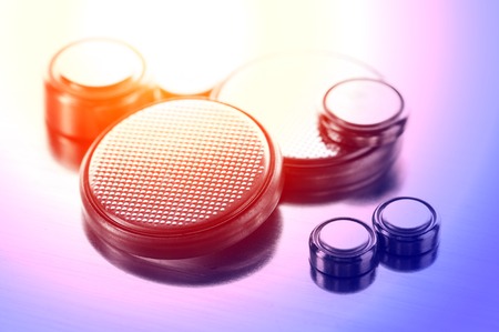 closeup button cell battery or watch battery or coin cell, used to power small electronics devices such as wrist watches or computer motherboard.の写真素材