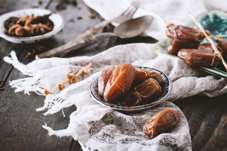 closeup sweet dried date palm fruits or kurma, ramadan (ramazan) foodの写真素材