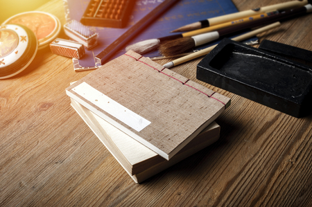 closeup vintage style of Japanese stab binding on wooden deskの写真素材