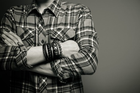 The man wearing bracelets, casual style of men accessories. Shallow depth of field.の写真素材