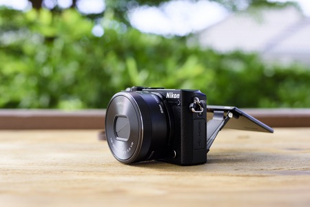 BANGKOK, THAILAND - JUNE 23, 2017: Black Nikon 1 J5 with 1 Nikkor 10-30mm attached. The Nikon 1 J5 is a digital mirrorless camera announced by Nikon on April 2, 2015.のeditorial素材