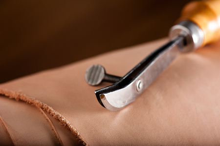 tool for leather working with vegetable tanned leatherの写真素材