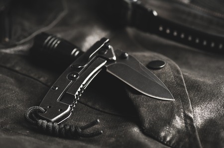 stainless steel pocketknife with blackwash finish on blade and handleの写真素材