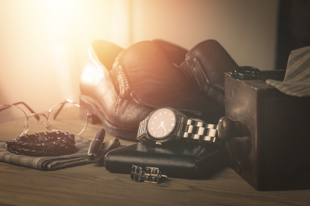 men's accessories, closeup at the luxury automatic wristwatch with black dial and stainless steel bracelet.の写真素材