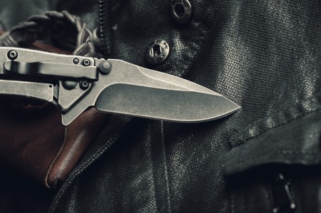 stainless steel pocketknife with blackwash finish on blade and handleの写真素材