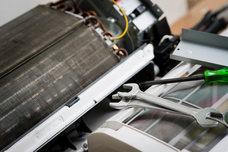 Air conditioning service, repair & maintenance concept. closeup at the wrench.の写真素材