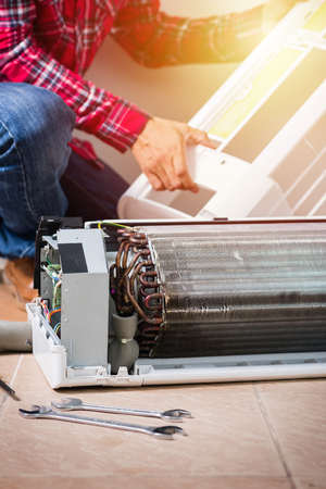 Air conditioning service, repair & maintenance concept. closeup at an indoor unit coil.の写真素材