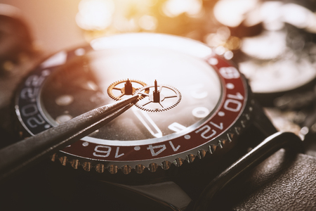 mechanical watch repairing concept. closeup the parts of mechanical wristwatch.の写真素材