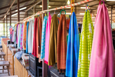 Closeup Thai silk cloth hanging in store in Thailand.の写真素材